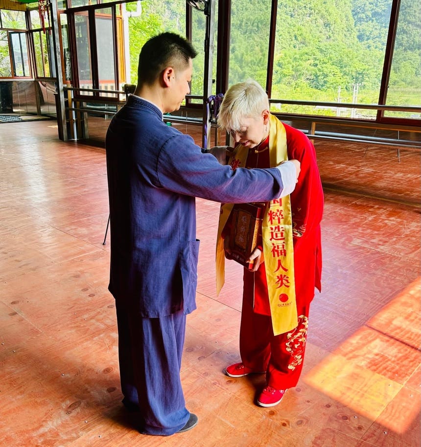 2793AB48-06BA-4772-A054-83B53245D68B_1_105_c Discipleship ceremony with Master Kim Wu and Maria van Bruggen.